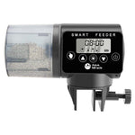 Qpets® Automatic Fish Feeder, 290ml Capacity, Programmable Fish Food Dispenser with Timer, Battery Operated, Flexible Installation, LCD Display, Adjustable Food Outlet for Portion Control