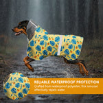 Qpets® Dog Raincoat with Clear Hood, Reflective Pet Raincoat Jacket Pet Poncho Lightweight Pet Rain Clothes with Adjustable Belly Strap Leash Hole Stylish Tropical Leaves & Orange Pattern, 2XL