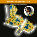 Qpets® Dog Raincoat with Clear Hood, Reflective Pet Raincoat Jacket Pet Poncho Lightweight Pet Rain Clothes with Adjustable Belly Strap Leash Hole Stylish Tropical Leaves & Orange Pattern, 2XL